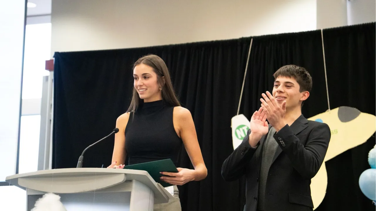 Caprielle Terry and Ryan Arias presenting awards