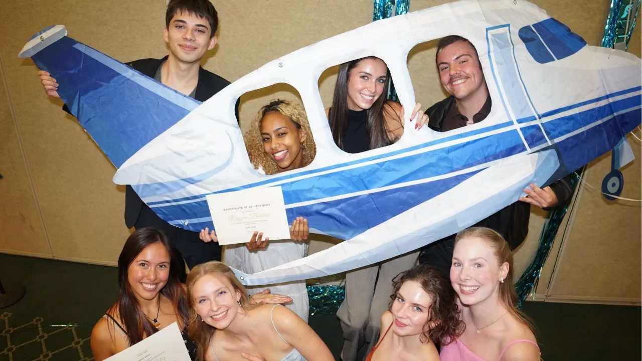 Midas team in airplane
