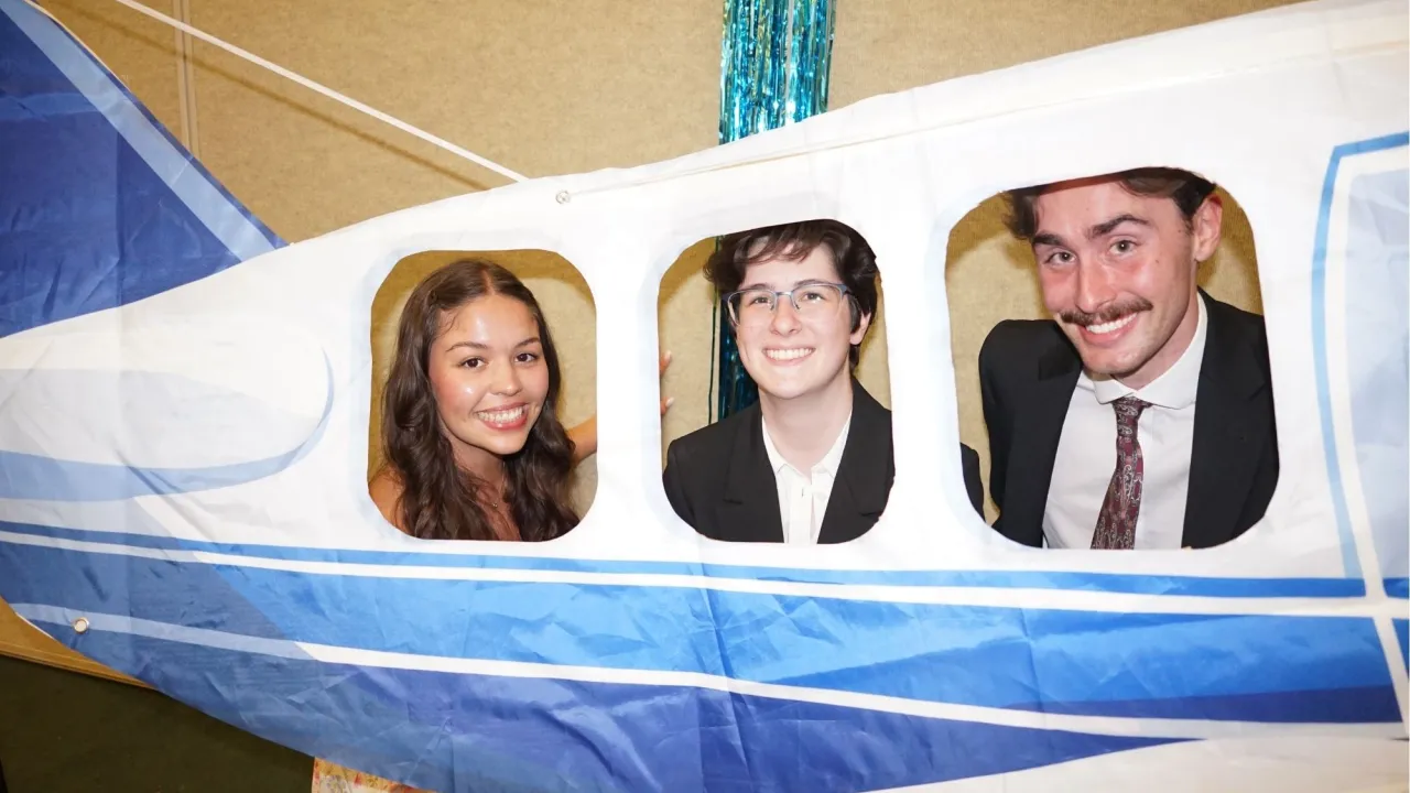 Niner Times team in airplane