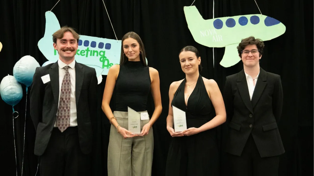 Itziar Carrasco Gomez and Caprielle Terry presented with award by Davis Cuffe and Clare Grealey