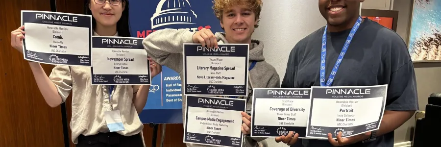 students showing awards