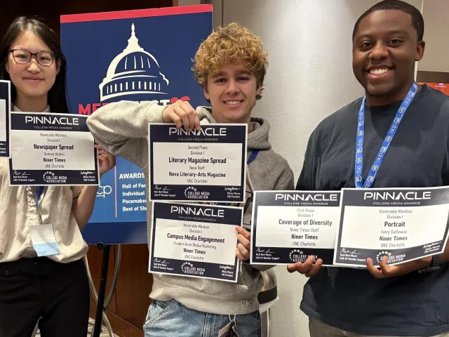 students showing awards